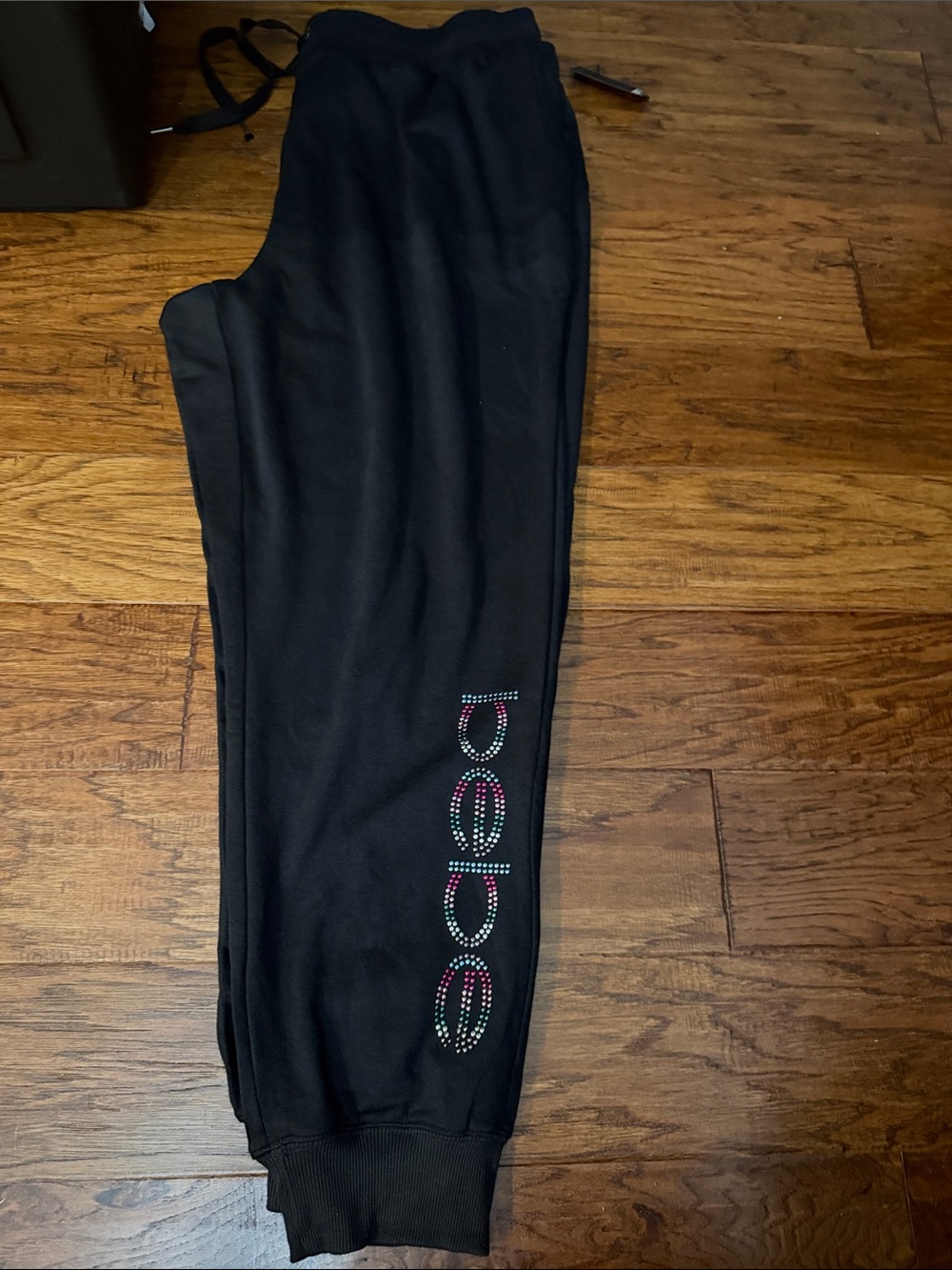 bebe Black Joggers with Multicolor Rhinestone Logo Down Leg